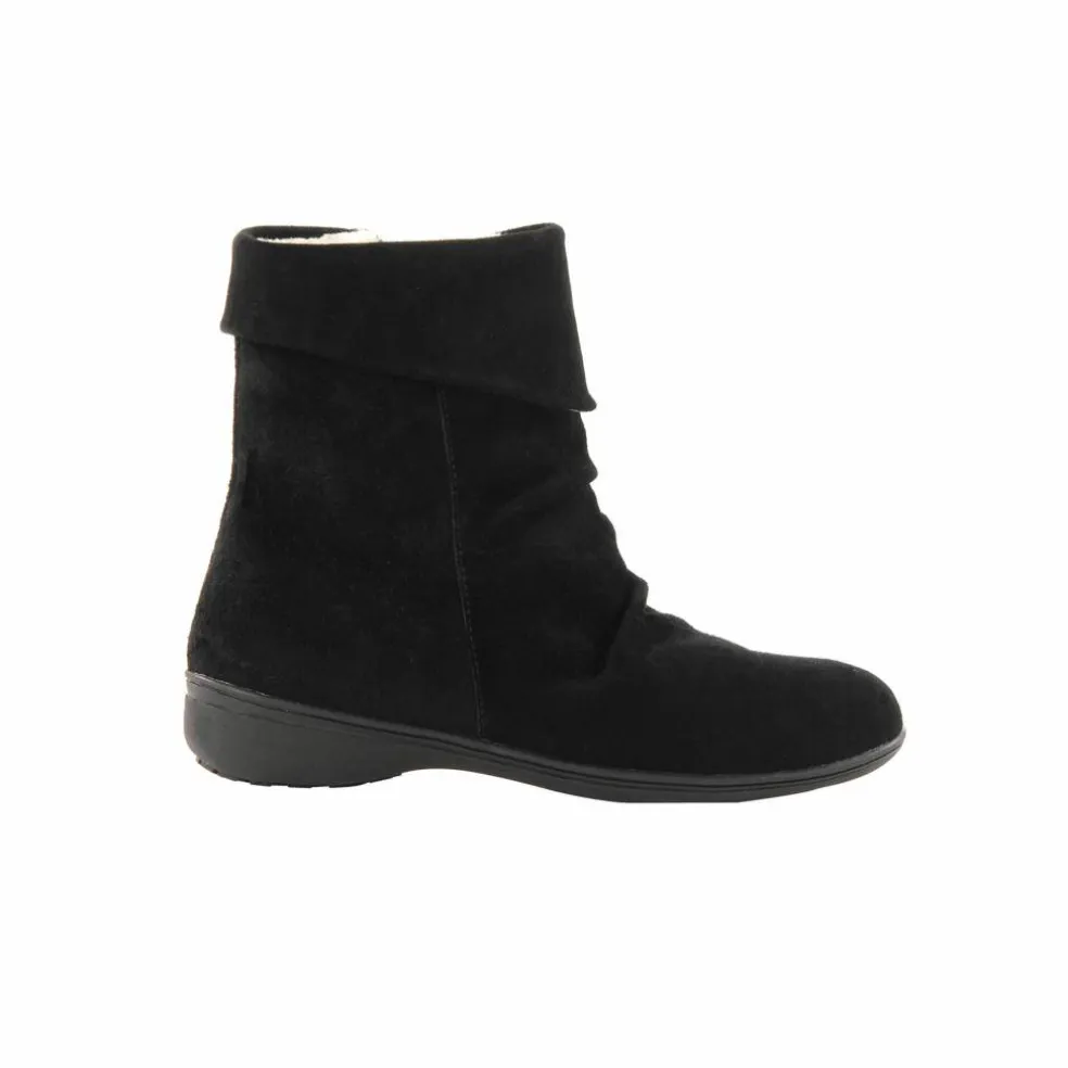 Boots fourrées en croûte de cuir