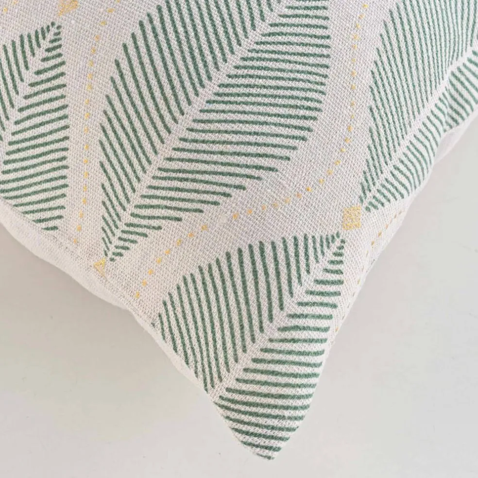 Coussin imprimé feuilles détails dorés