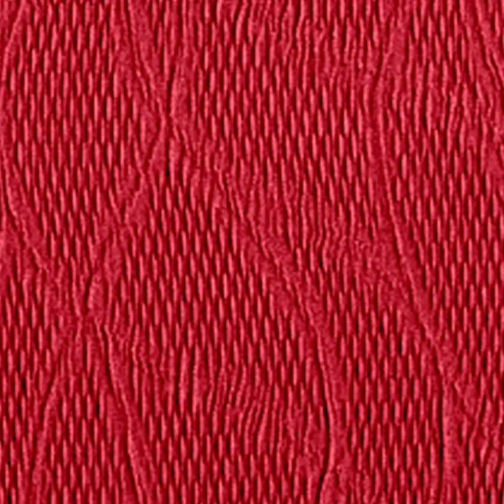 Housse extensible motif jacquard "serpentins" pour fauteuil et canapé