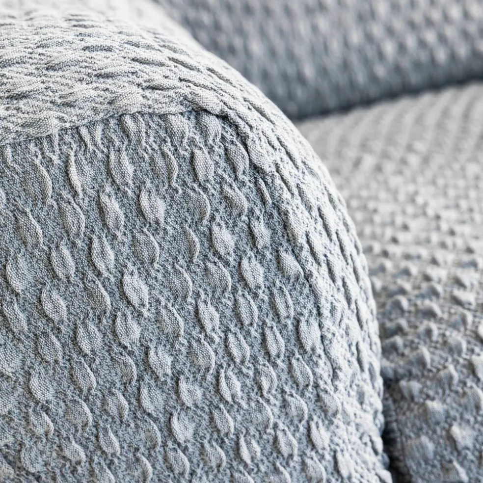 Housse gaufrée bi-extensible canapé fauteuil accoudoirs