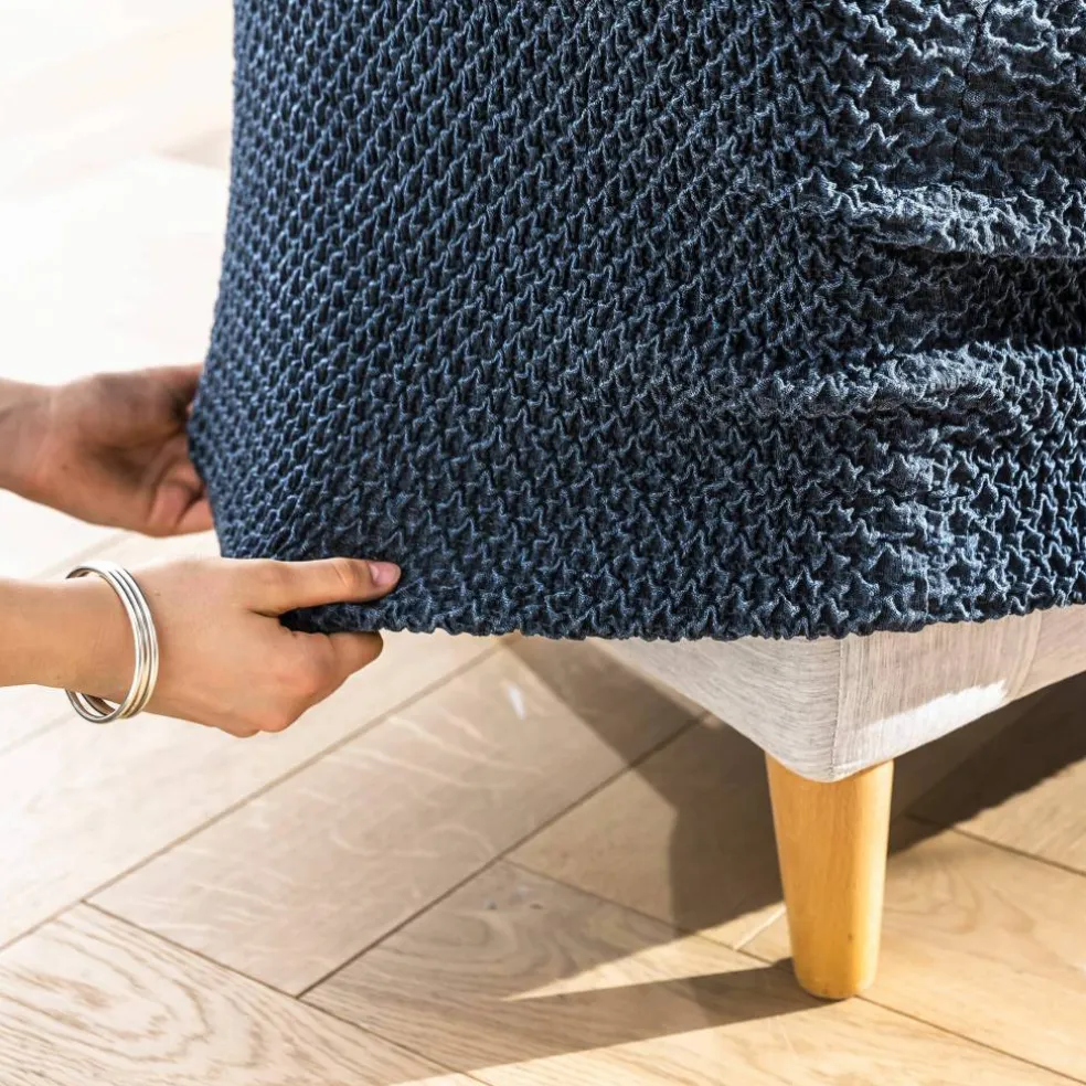 Housse texturée bi-extensible spéciale canapé fauteuil à accoudoirs
