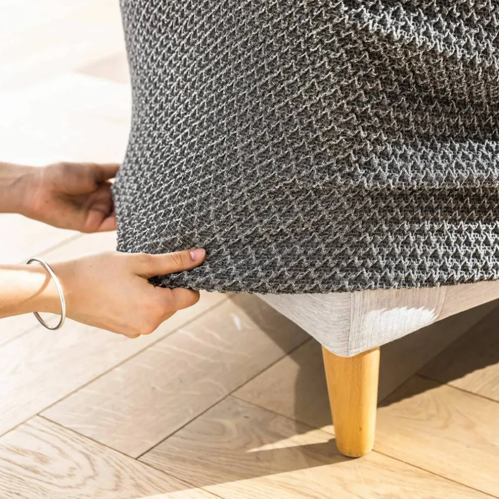 Housse texturée bi-extensible spéciale canapé fauteuil à accoudoirs