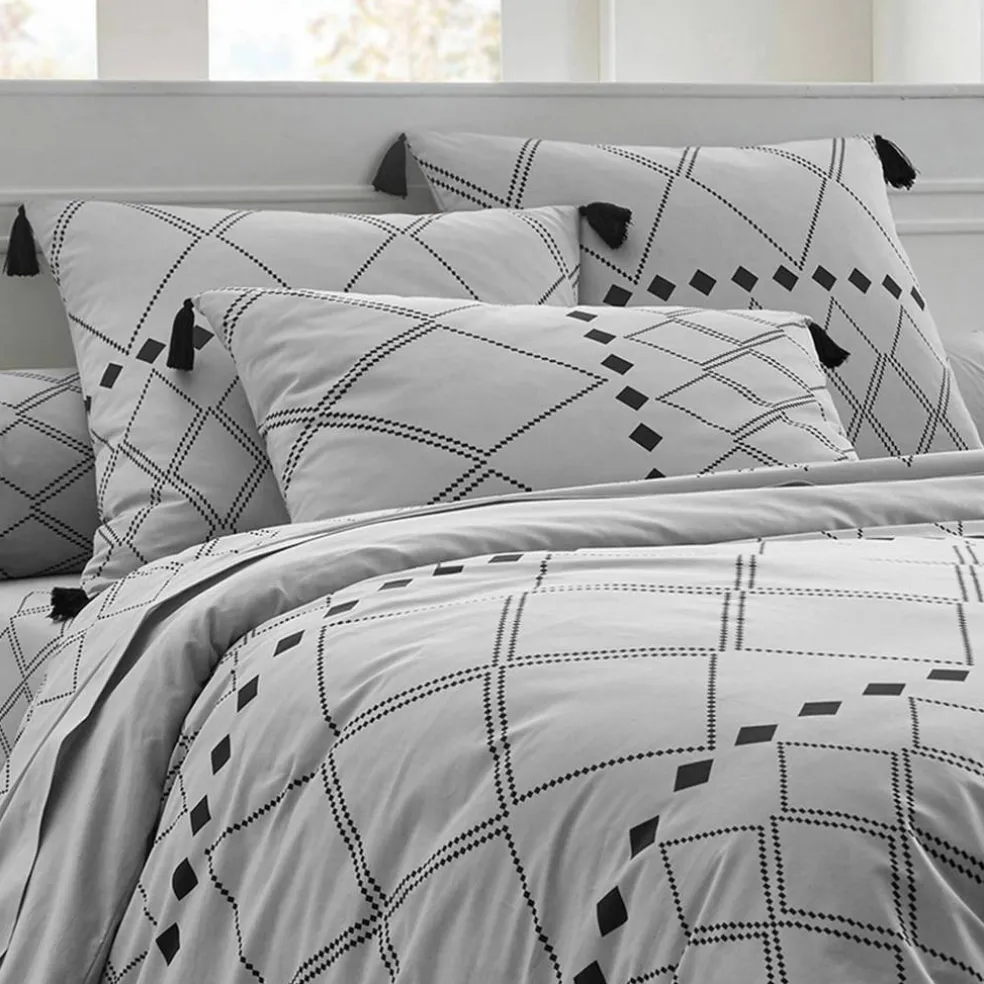Linge de lit Massaï coton à motifs graphiques et finitions pompons