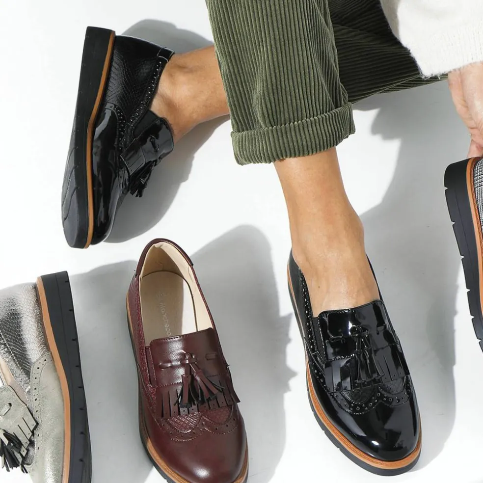 Mocassins compensés à franges et pompons