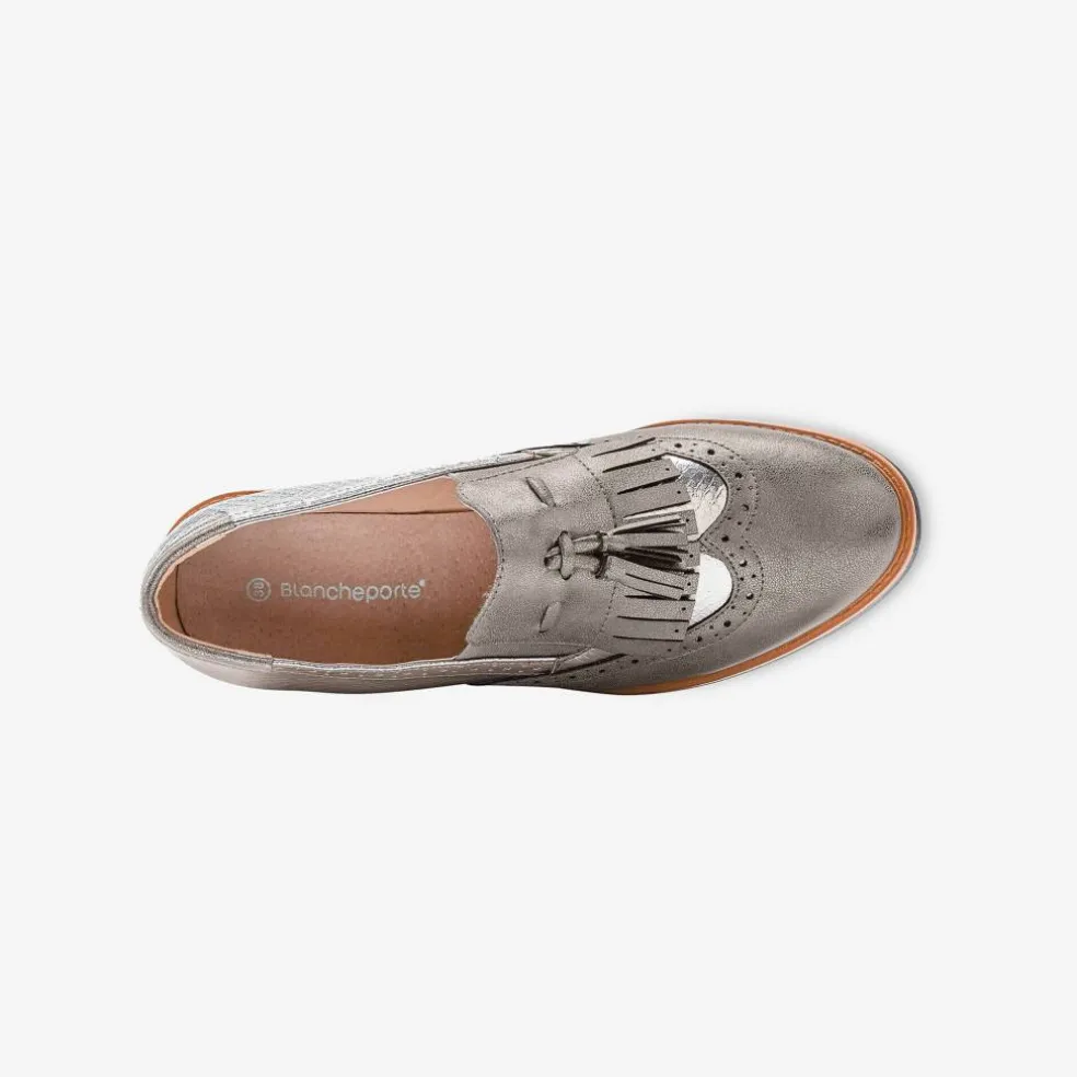 Mocassins compensés à franges et pompons