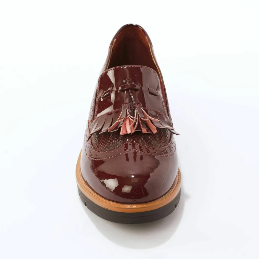 Mocassins compensés à franges et pompons