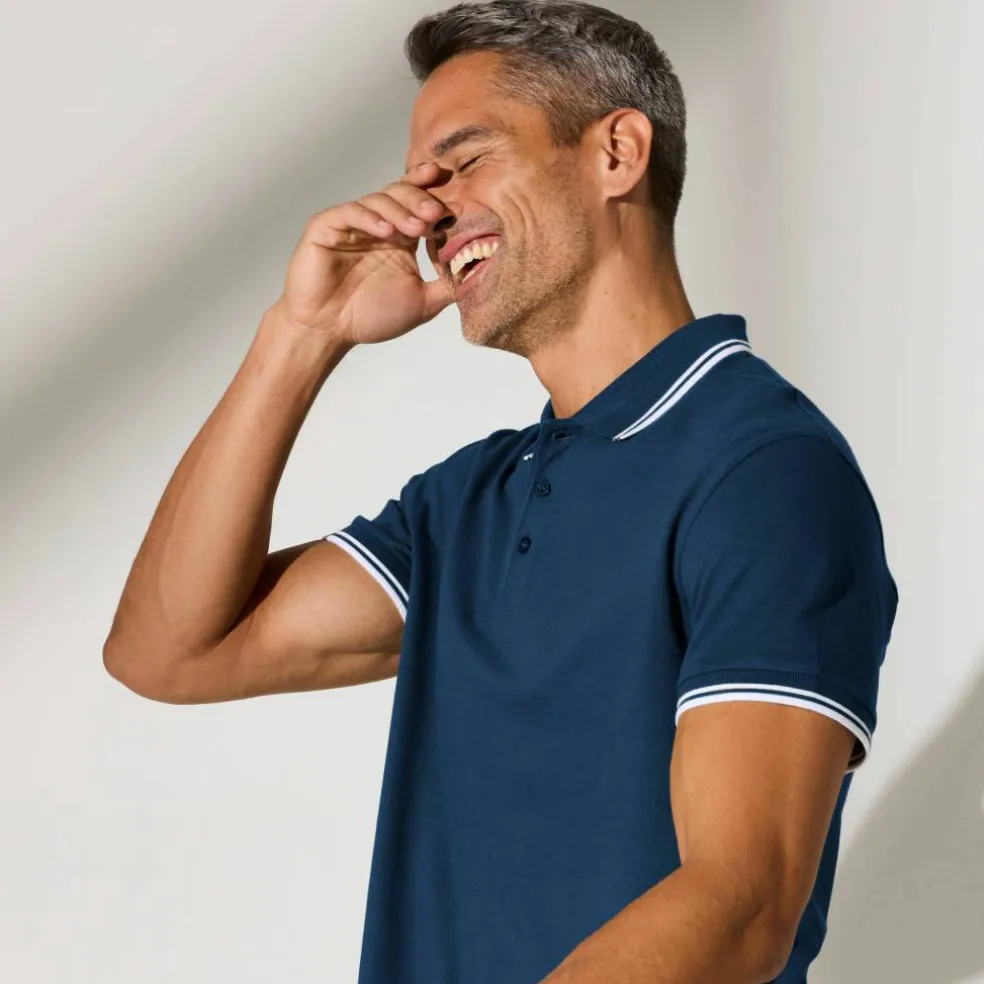 Polo uni maille piquée manches courtes